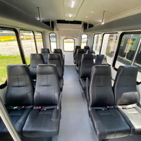NoMI Tours inside of 14 passenger shuttle bus